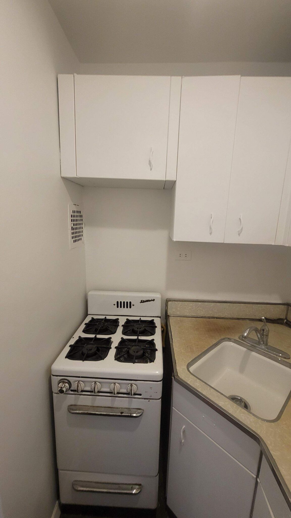 old kitchen with compact appliances white outdated kitchen cabinets